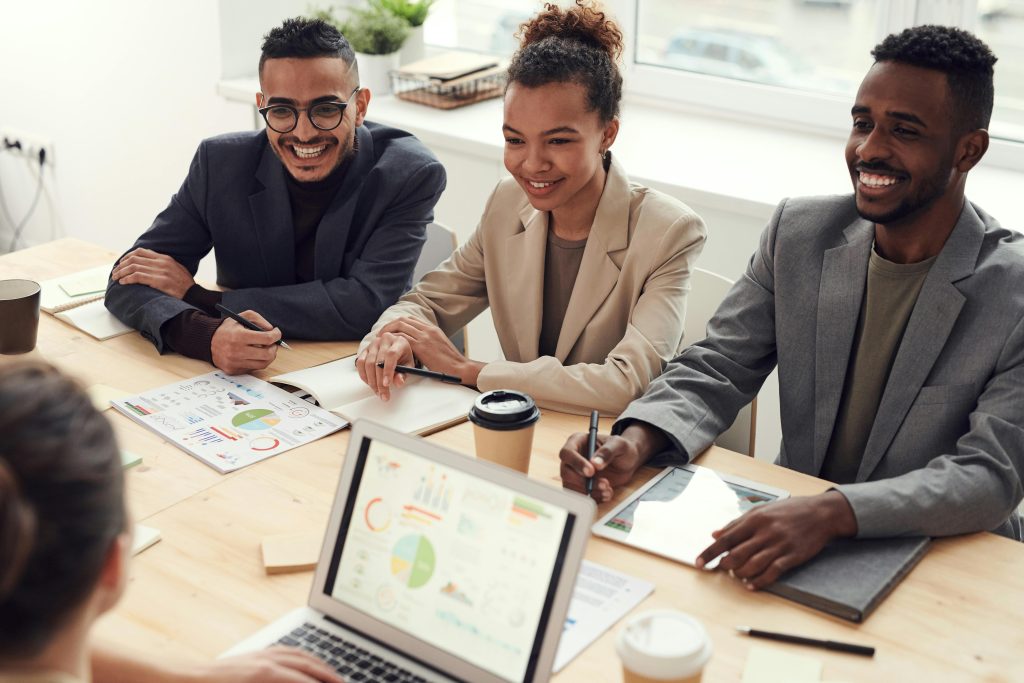 A group of professionals collaborating at a conference table